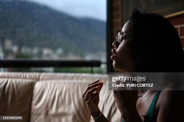 Venezuelan independent gender activist Andrea Hernandez speaks at her house about the "Yo si te creo" movement that was born in Venezuela regarding...