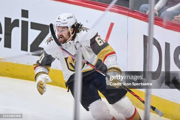Vegas Golden Knights right wing Mark Stone celebrates after scoring a game winning goal in overtime during a Stanley Cup Playoffs second round game...