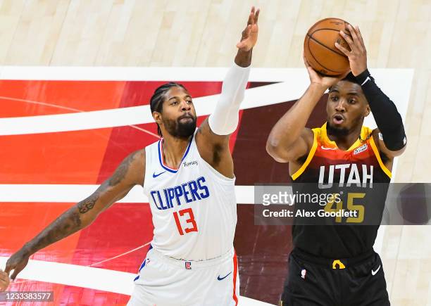 Donovan Mitchell of the Utah Jazz shoots over Paul George of the LA Clippers in Game Two of the Western Conference second-round playoff series at...