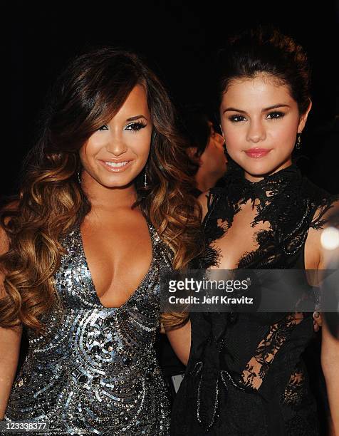 Singers Demi Lovato and Selena Gomez arrive at the 2011 MTV Video Music Awards at Nokia Theatre L.A. Live on August 28, 2011 in Los Angeles,...