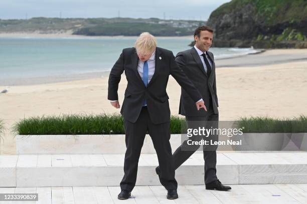 Prime Minister of United Kingdom, Boris Johnson and President of France, Emmanuel Macron share a joke during the Leaders official welcome and family...