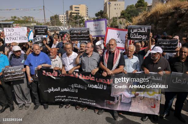 Ahmed Tibi , Israeli Arab Knesset member for the Joint List, joins Israeli, Palestinian and foreign activists, during a demonstration against Israeli...