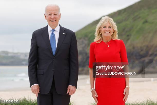 President Joe Biden and US First Lady Jill Biden arrive for the welcome prior to the start of the G7 summit in Carbis Bay, Cornwall on June 11, 2021....