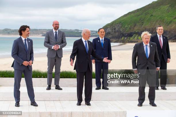 Prime Minister of United Kingdom, Boris Johnson stands with US President, Joe Biden and Prime Minister of Canada, Justin Trudeau during the Leaders...