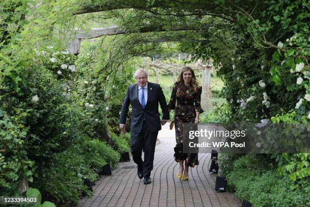 Prime Minister of United Kingdom, Boris Johnson and his wife Carrie Johnson arrive to attend a reception at The Eden Project during the G7 Summit on...