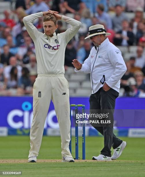 England's Joe Root reacts after bowling during the second day of the second Test match between England and New Zealand at Edgbaston Cricket Ground in...