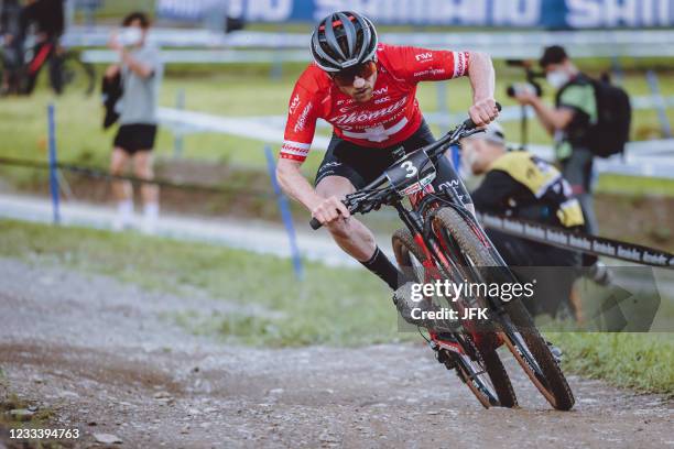 Switzerland's Mathias Flueckiger competes during the men's Cross Country Short Track competition of the UCI Mountain Bike World Cup in Leogang,...