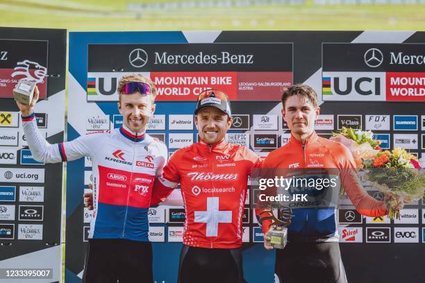 Second placed Czech Republics Ondrej Cink, winner Switzerland's Mathias Flueckiger and third placed Netherland's Milan Vader celebrate after the...