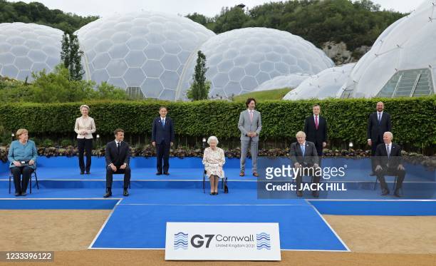 Britain's Queen Elizabeth II , poses for a family photograph with, from left, Germany's Chancellor Angela Merkel, President of the European...