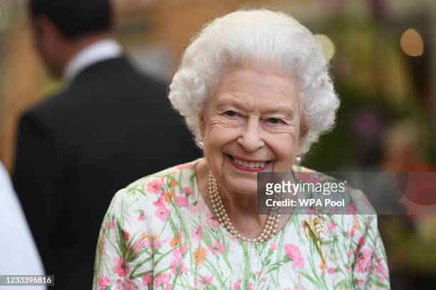Queen Elizabeth II attends an event in celebration of The Big Lunch initiative at The Eden Project during the G7 Summit on June 11, 2021 in St...