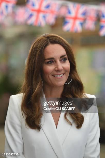 Britain's Catherine, Duchess of Cambridge smiles as she meets people from communities across Cornwall during an event in celebration of The Big Lunch...