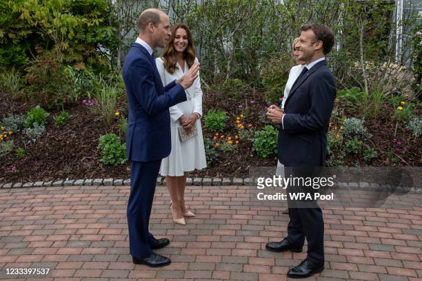 Prince William, Duke of Cambridge and Catherine, Duchess of Cambridge chat with French President Emmanuel Macron and his wife Brigitte Macron at a...