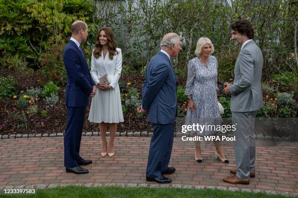 Prince William, Duke of Cambridge, Catherine, Duchess of Cambridge, Camilla, Duchess of Cornwall and Prince Charles, Prince of Wales chat with...