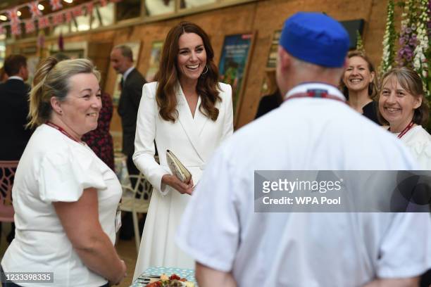 Catherine, Duchess of Cambridge smiles as she meets people from communities across Cornwall at an event in celebration of The Big Lunch initiative at...