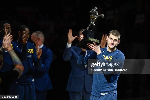 Nikola Jokic of the Denver Nuggets accepts the 2021 NBA MVP award before Game Three of the Western Conference second-round playoff series at Ball...