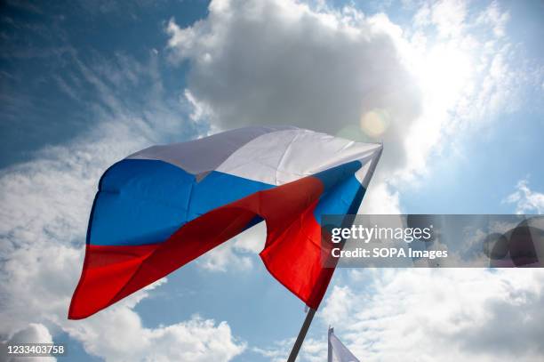 The Flag of the Russian Federation is raised during a rally in Tambov. On June 10, the youth held a solemn rally in celebration of the Day of Russia...