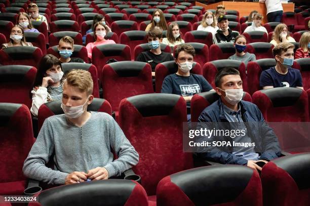 People seen wearing facemask as a preventive measure against the spread of Covid19 inside a cinema hall in Tambov. Due to the Covid-19 situation in...