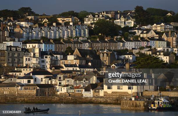 Police boat patrols the waters during the G7 summit in Carbis bay, Cornwall on June 12, 2021.