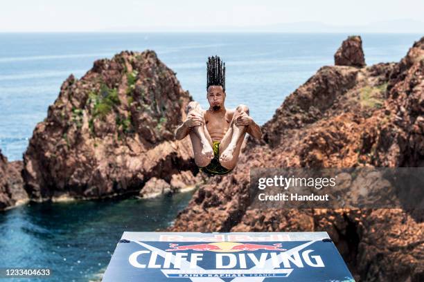 In this handout image provided by Red Bull, Nate Jimerson of the USA dives from the 27 metre platform during the first stop of the Red Bull Cliff...