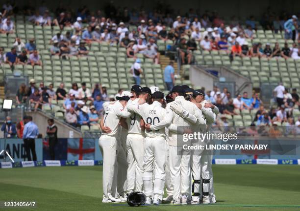 England players huddle before start of play on the third day of the second Test cricket match between England and New Zealand at Edgbaston Cricket...