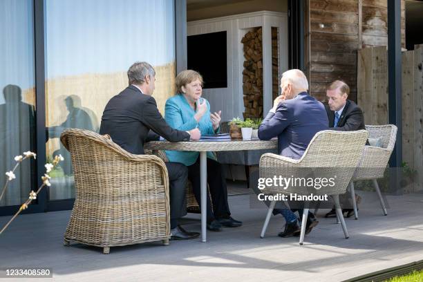 Chancellor Angela Merkel and US President Joe Biden at the beginning of their conversation on the sidelines of the G7 summit in St. Ives, together...