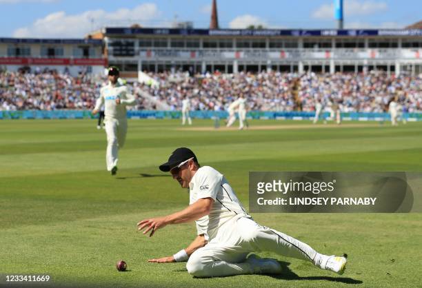 New Zealand's Neil Wagner stops the ball short of the boundary on the third day of the second Test cricket match between England and New Zealand at...