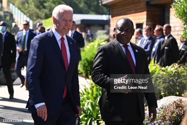 President Joe Biden talks with South Africa's President Cyril Ramaphosa at the G7 summit in Carbis Bay on June 12, 2021 in Carbis Bay, Cornwall. UK...