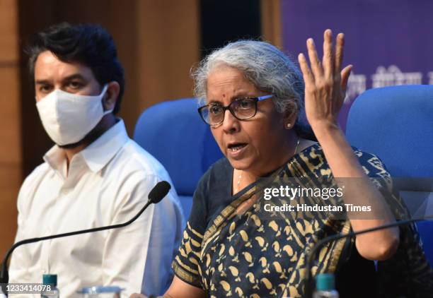 Union Finance Minister Nirmala Sitharaman with MoS Anurag Thakur and other officials addressing a press conference over meeting of GST Council to...