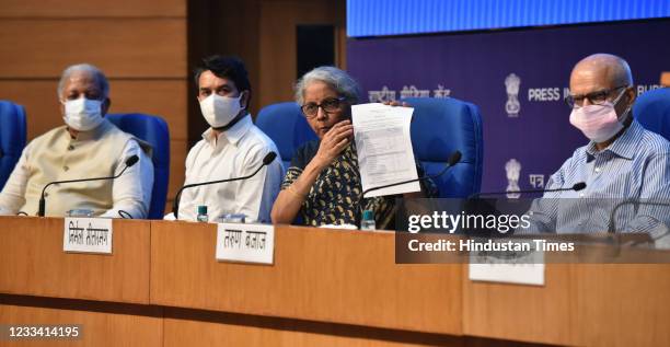 Union Finance Minister Nirmala Sitharaman with MoS Anurag Thakur and other officials addressing a press conference over meeting of GST Council to...