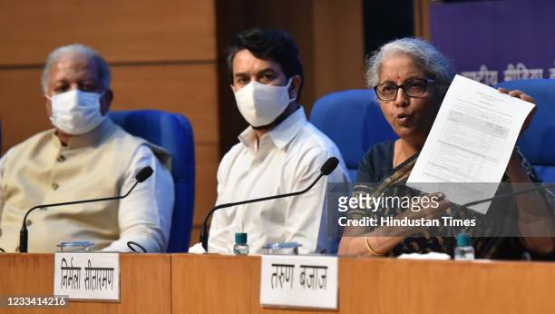 Union Finance Minister Nirmala Sitharaman with MoS Anurag Thakur and other officials addressing a press conference over meeting of GST Council to...
