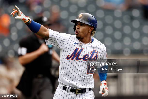 Francisco Lindor of the New York Mets reacts after hitting a 2-run home run during the first inning against the San Diego Padres at Citi Field on...