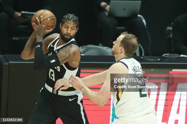 Clippers guard Paul George guarded by Utah Jazz guard Joe Ingles during game 3 of the second round of the NBA Western Conference playoffs between the...