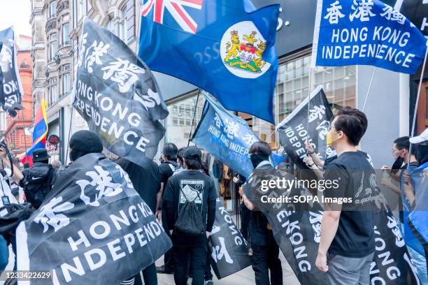 Protesters hold flags during the demonstration. On June 12th 2019, protestors in Hong Kong took to the streets calling for the retraction of the...