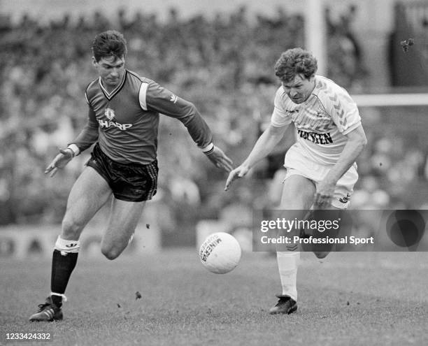 Billy Garton of Manchester United and Clive Allen of Tottenham Hotspur compete for the ball during a Canon League Division One match at White Hart...