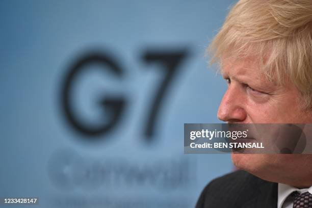 Britain's Prime Minister Boris Johnson takes part in a press conference on the final day of the G7 summit in Carbis Bay, Cornwall on June 13, 2021.