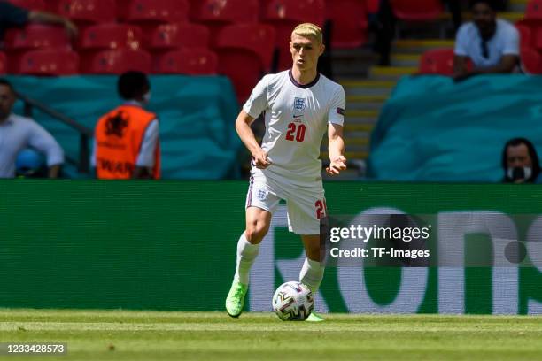 Phil Foden of England controls the ball during the UEFA Euro 2020 Championship Group D match between England and Croatia at Wembley Stadium on June...