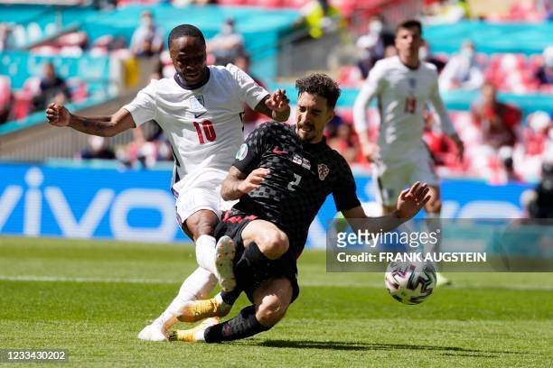 England's forward Raheem Sterling scores his team first goal past Croatia's defender Sime Vrsaljko during the UEFA EURO 2020 Group D football match...