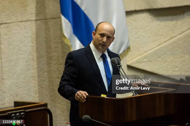 Desingnated Israeli Prime Minister Naftali Bennett speaks before parliament votes on a new government on June 13, 2021 in Jerusalem, Israel. The new...