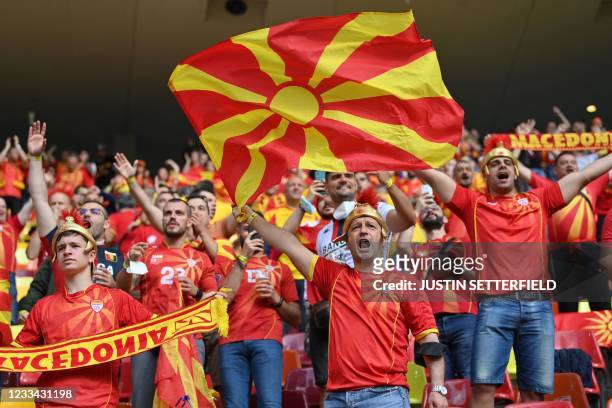 North Macedonia fans cheer for their team before the UEFA EURO 2020 Group C football match between Austria and North Macedonia at the National Arena...