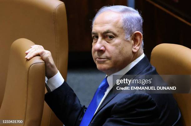 Israel's Prime Minister Benjamin Netanyahu attends a special session to vote on a new government at the Knesset in Jerusalem, on June 13, 2021. - A...