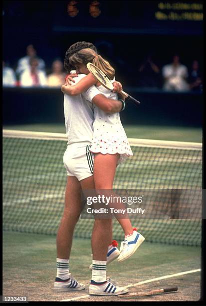 JOHN AUSTIN AND TRACY AUSTIN OF THE UNITED STATES CELEBRATE THEIR VICTORY IN THE MIXED DOUBLES AT THE 1980 WIMBLEDON TENNIS CHAMPIONSHIPS. THE...