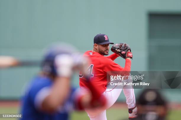 Martin Perez of the Boston Red Sox pitches in the first inning against the Toronto Blue Jays at Fenway Park on June 13, 2021 in Boston, Massachusetts.