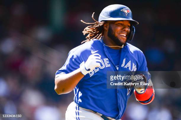 Vladimir Guerrero Jr. #27 of the Toronto Blue Jays celebrates after hitting a two-run home run in the seventh inning against the Boston Red Sox at...