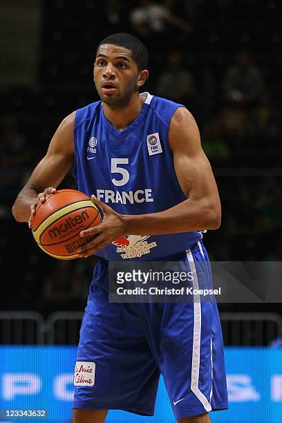 Nicolas Batum of France throws the ball during the EuroBasket 2011 first round group B match between Israel and France at Siauliai Arena on September...