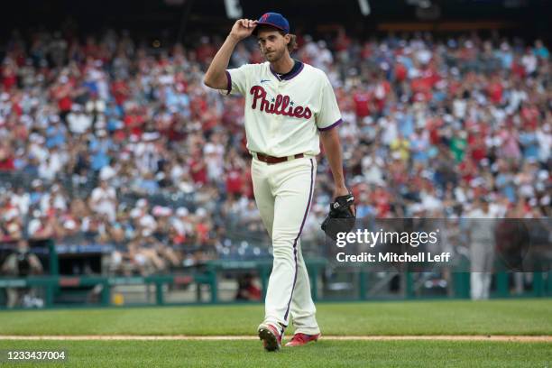 Aaron Nola of the Philadelphia Phillies tips his cap to the crowd after being removed from the game in the top of the eighth inning against the New...