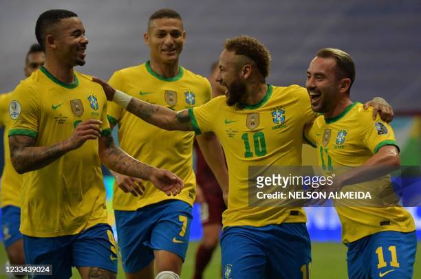 Brazil's Neymar celebrates with teammates Gabriel Jesus, Richarlison and Everton Ribeiro after scoring against Venezuela during the Conmebol Copa...