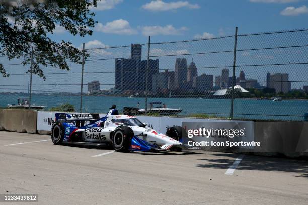 Indy Car series driver Graham Rahal drives along the Detroit River with the Detroit city skyline in the background during the Chevrolet Detroit Grand...