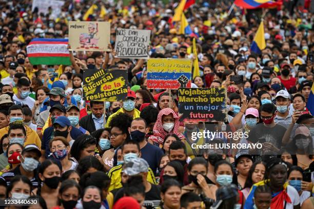 Demonstrators participate in the inauguration of a monument to the resistance built by protestors and locals amid ongoing protests against the...