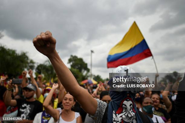 Demonstrators participate in the inauguration of a monument to the resistance built by protestors and locals amid ongoing protests against the...