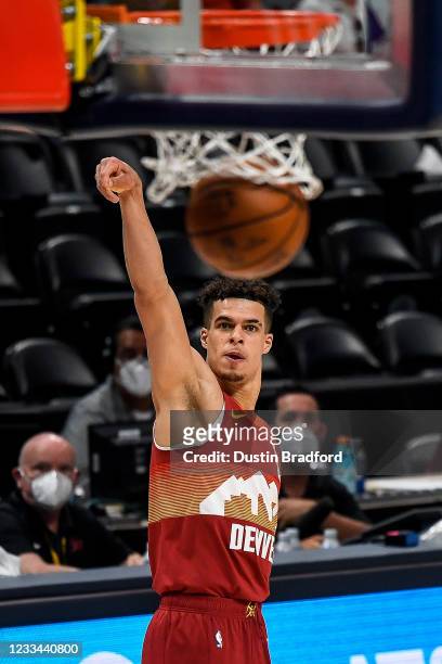 Michael Porter Jr. #1 of the Denver Nuggets watches a shot drop through the net in a game against the Phoenix Suns in Game Four of the Western...